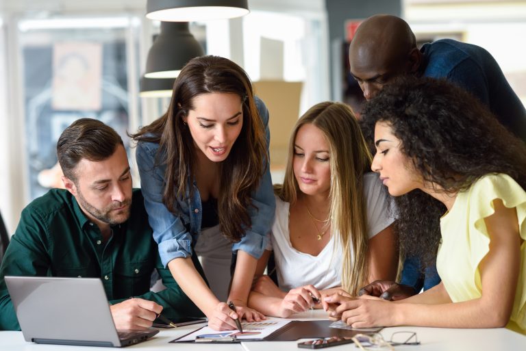 multi-ethnic-group-of-young-men-and-women-studying-indoors-768x513